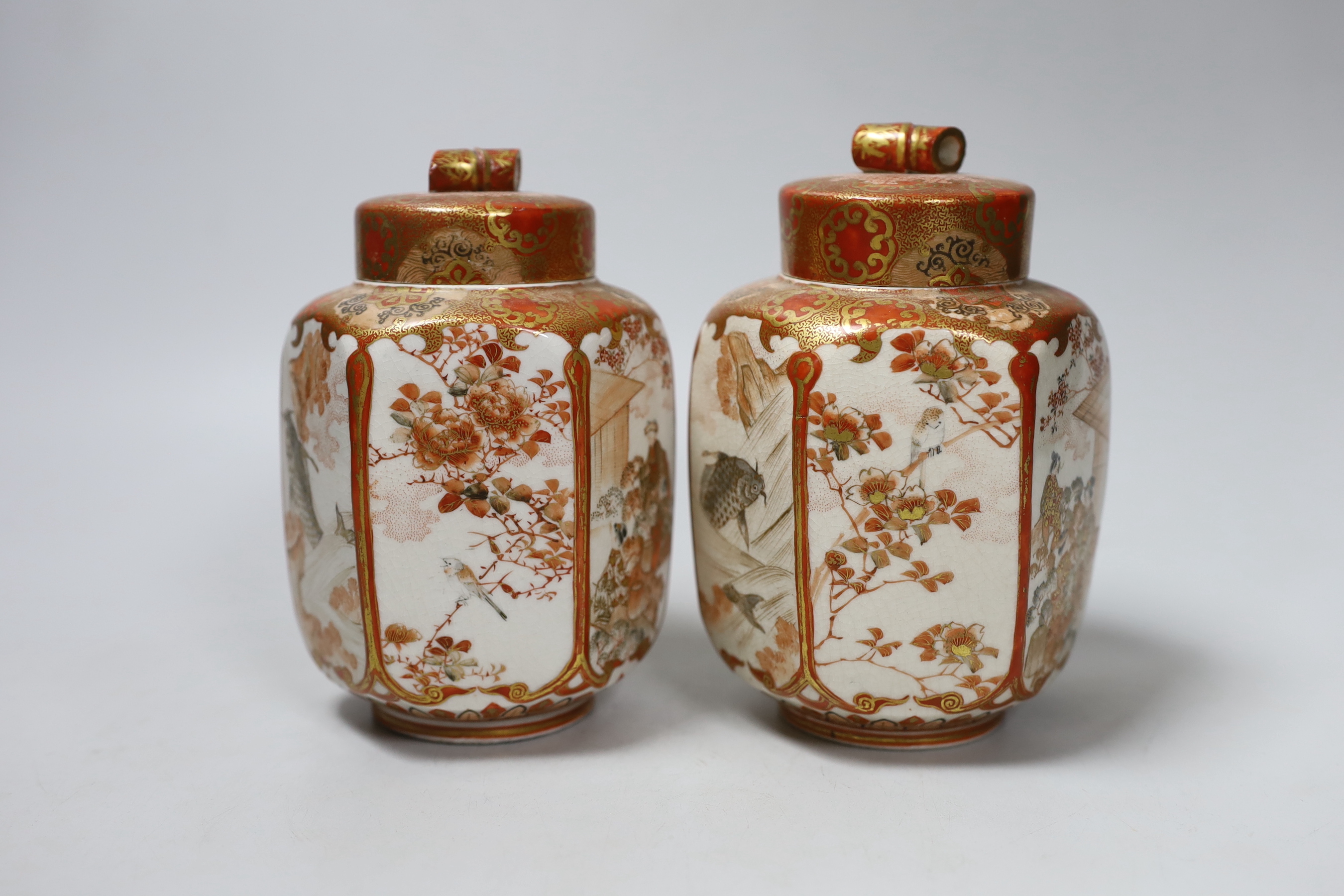 A pair of Meiji period Kutani hexagonal jars and covers, with inner and outer covers, 14cm high